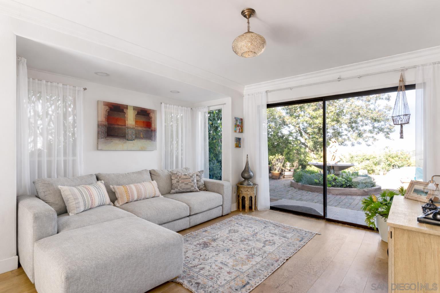 Secondary sitting room with slider to private courtyard patio